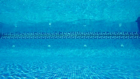 swimming pool underwater, blue water background