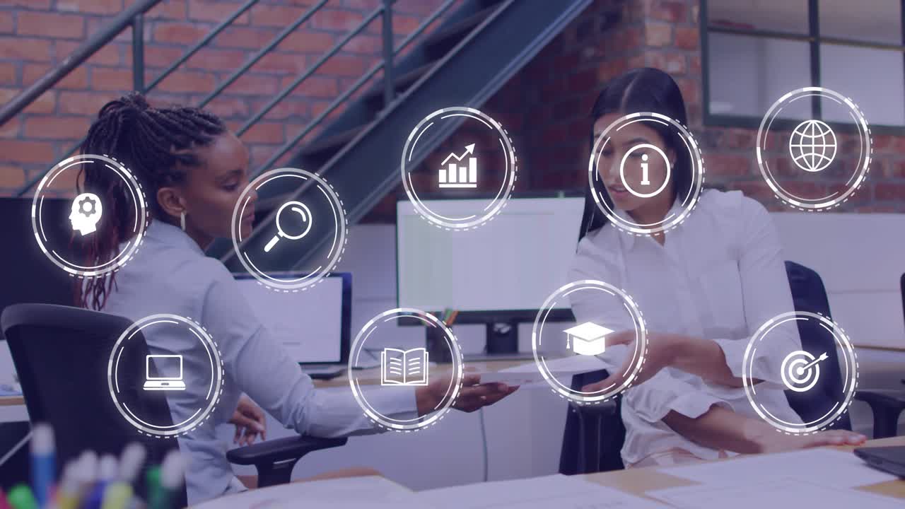 Two women handing document in open office, HUD icons appearing over paper, reviewing for business