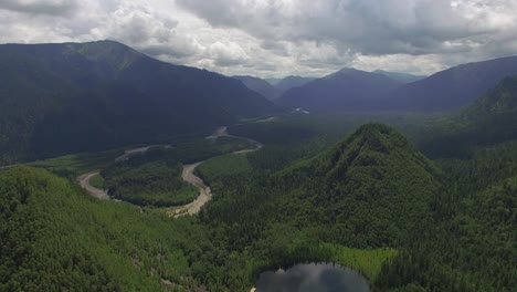 aerial photography. heavenly landscape of the landscape with a mountain lake in siberia near lake baikal. warm lake of the snezhnaya river. vydrino