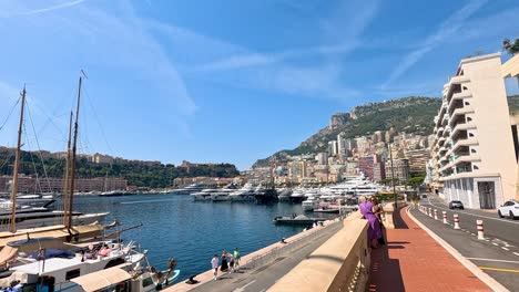 tourists enjoy a sunny day by the pier