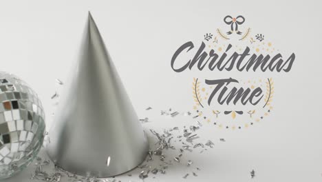 animation of christmas greetings text over christmas disco ball and party hat