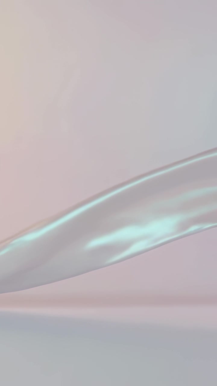 Vertical video: Starting iridescent band sliding in studio, showing faint baseline and pearly sheen