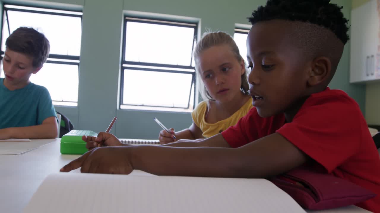 Group of kids studying in the class