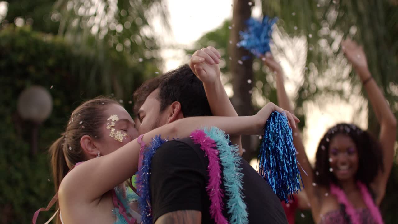 Young Adults Celebrating at an Outdoor Carnival Party