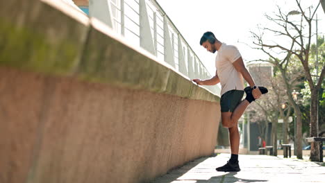 Man,-stretching-and-exercise-with-music-headphones