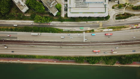 aerial top down of traffic road highway in hong kong china asia, pollution smog and traffic problem concept