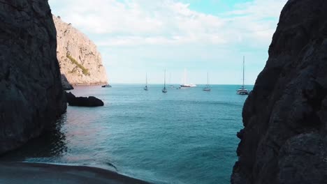 backward flight of drone in sa calobra and torrent de pareis