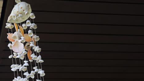 a hanging floral arrangement sways gently indoors.