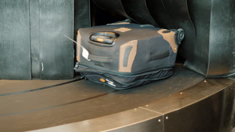 luggage on airport carousel