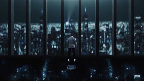 businessman lonely looking at the night city