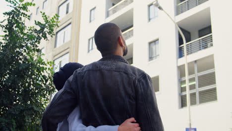 young couple standing on street 4k