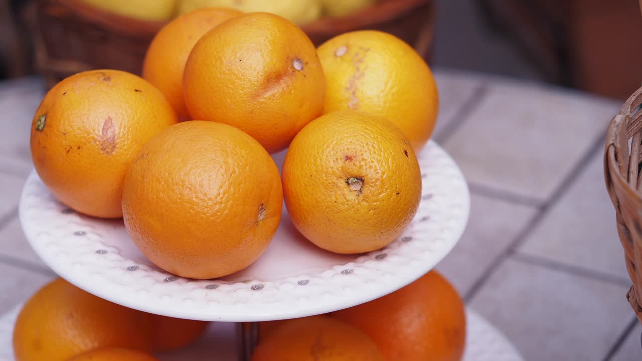 Oranges on a tiered plate