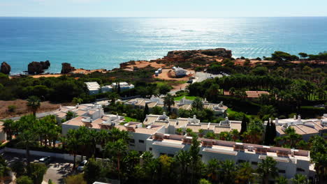 beautiful lighting algarve coast with blue ocean,blue sky and bright sun in portuguese holiday area