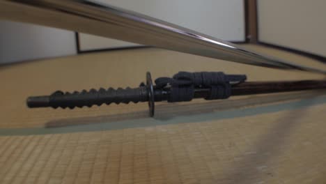 samurai swords being drawn on tatami