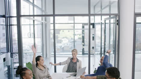 a group of businesspeople joining their hands