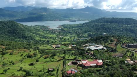 road trip on indian road in monsoon - rainy season seen here at dudhiware khind at lonavala, india - most selling stock aerial drone footage