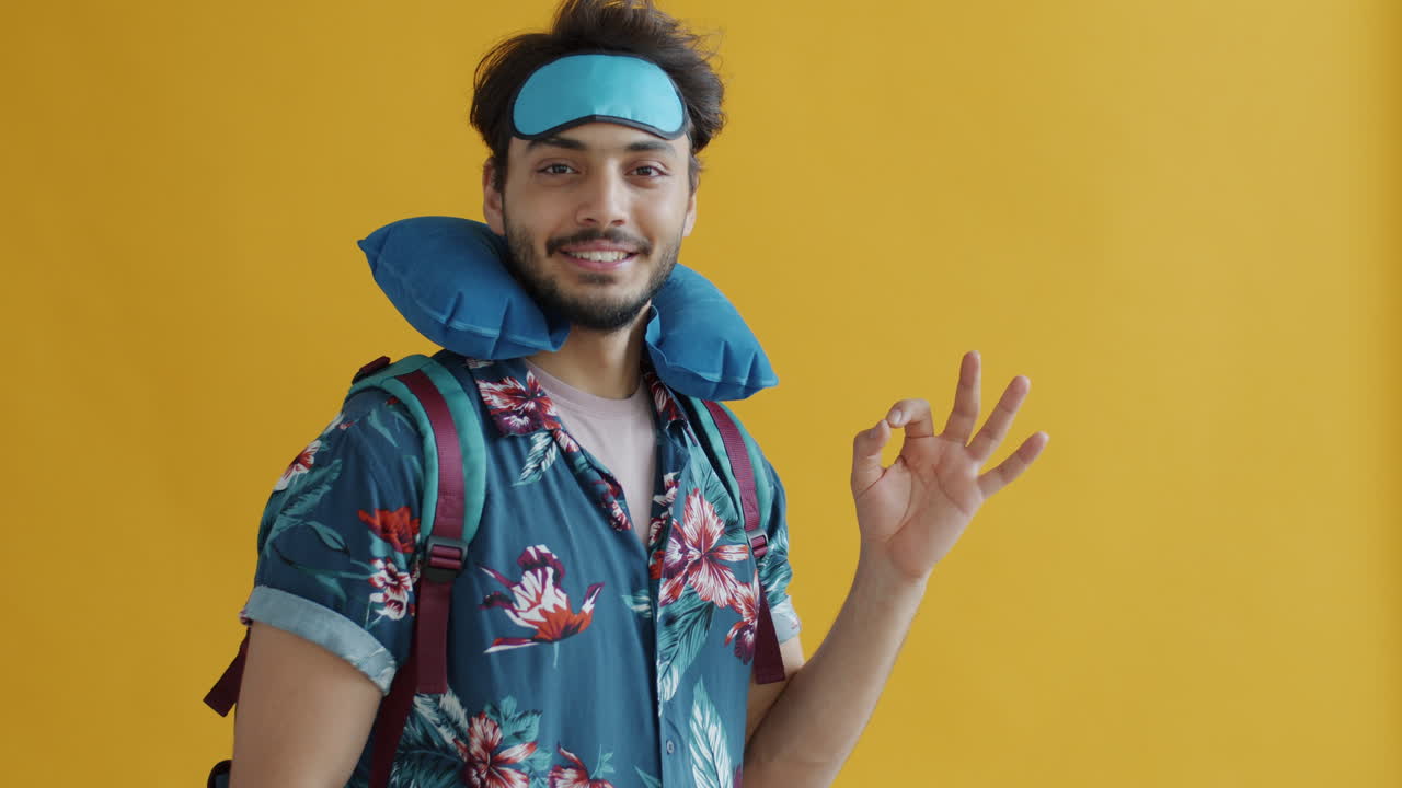 Happy Traveler with Backpack and Sleep Mask
