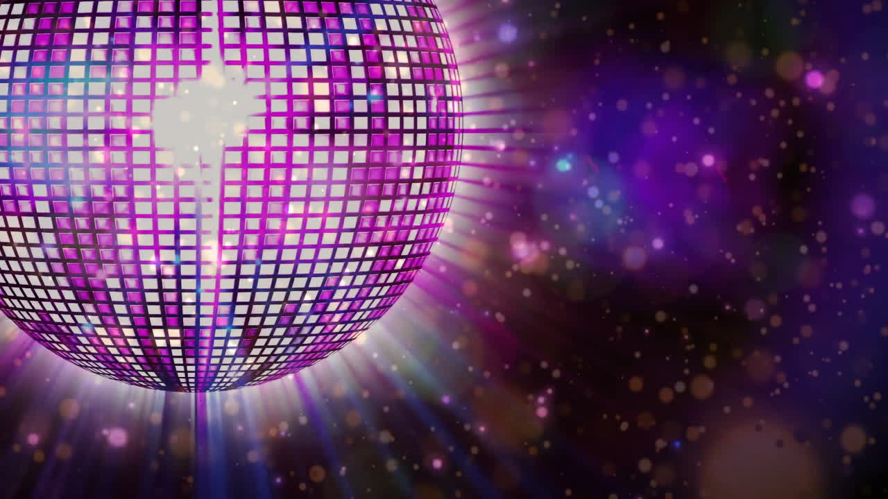 Rotating purple disco ball with sparkling lights animation over dark background