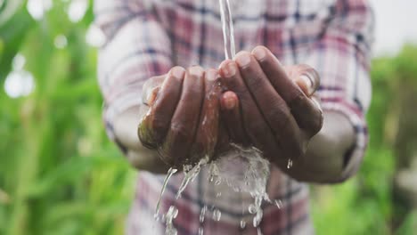 Focus-on-African-American-man-washing-his-hands