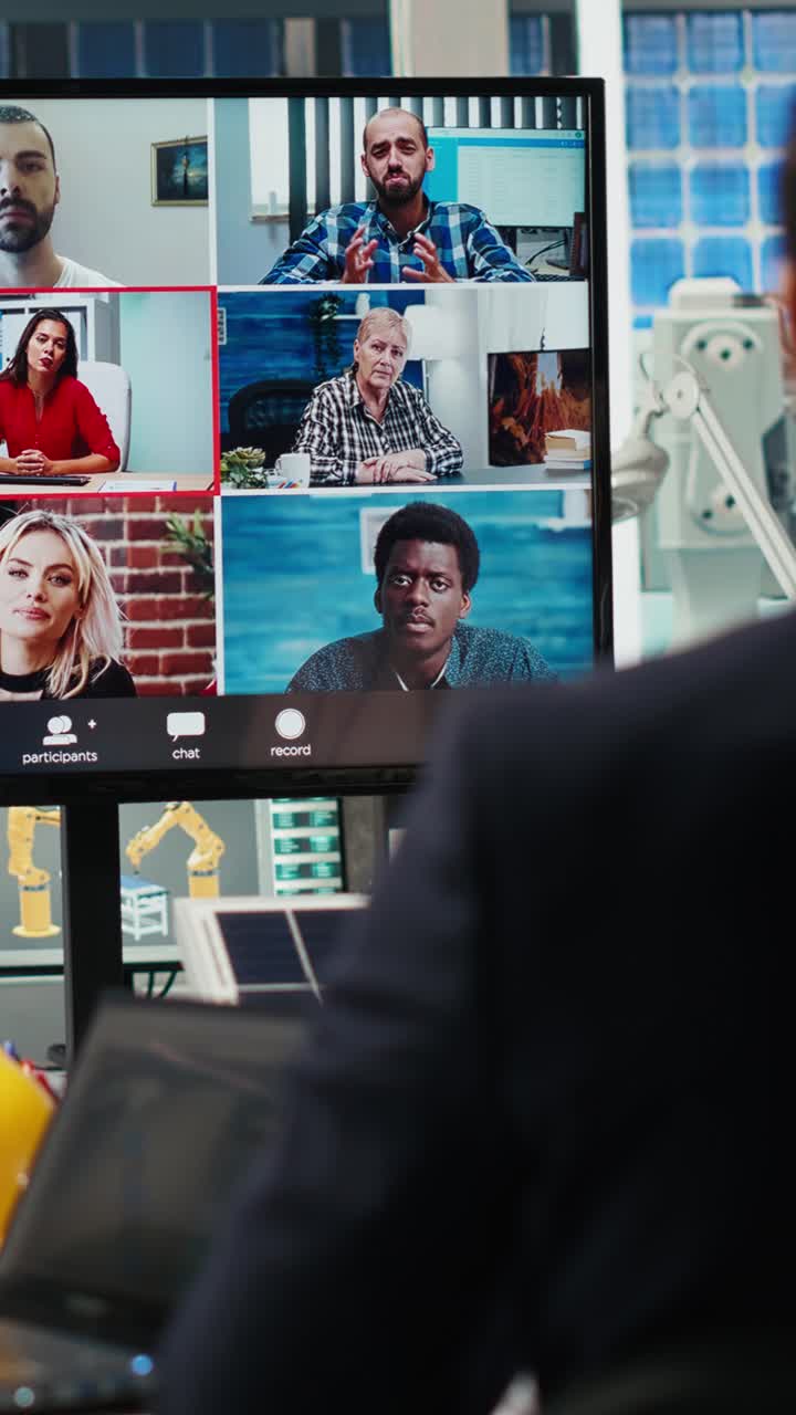 Vertical video Factory researchers doing internet videocall, working on breakthroughs