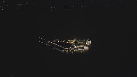 night view of unique architecture at lake city with dramatic lighting from unique perspective video is taken at udaipur rajasthan india.