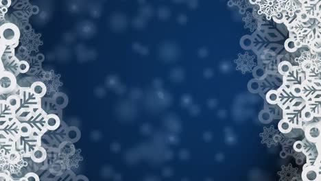 Snowflakes-forming-a-frame-over-white-spots-falling-against-blue-background