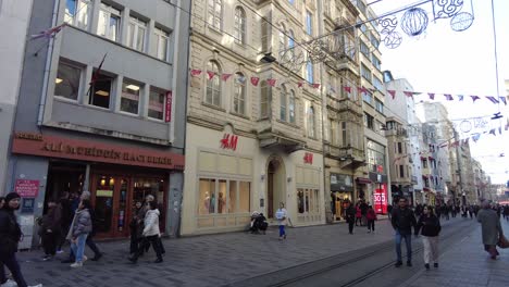 people walking on a busy street in istanbul, turkey