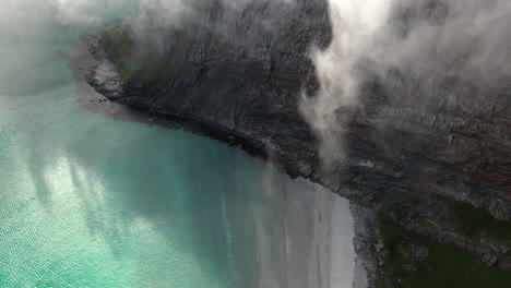 wide aerial footage of the island of vaeroy - a part of lofoten islands in norway