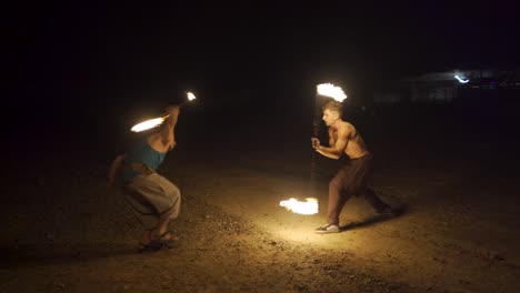 fire juggling at night music festival