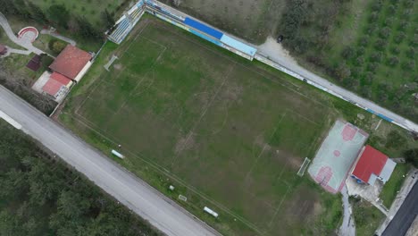 intriguing placement of the soccer field across the street from the local cemetery