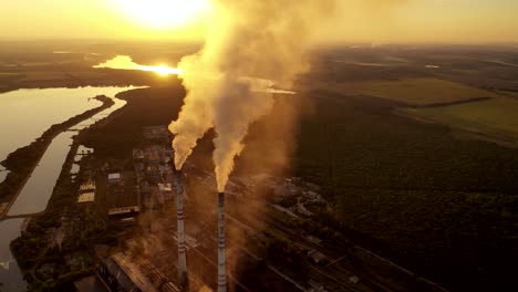 smoking industrial pipes. aerial view of old factory with pipes