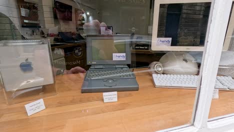 showcase of old apple computers and accessories