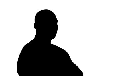 muscular silhouette of man with arms crossed