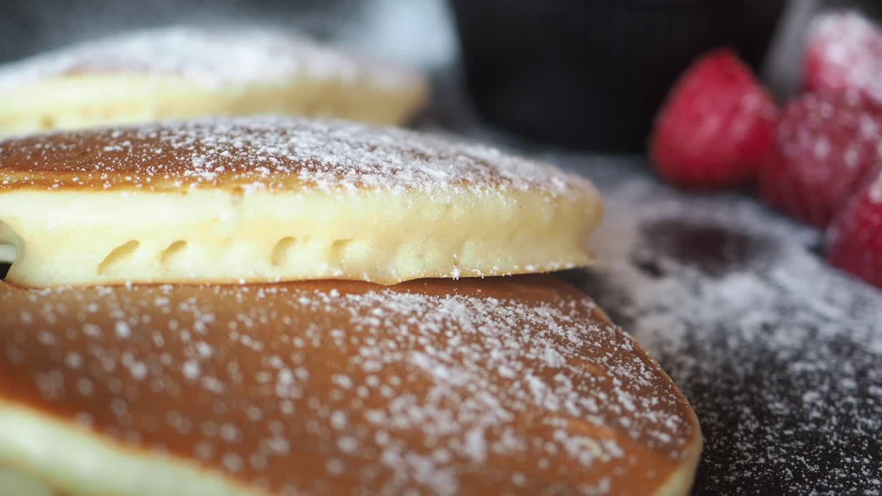 Pancakes with Raspberries and Powdered Sugar