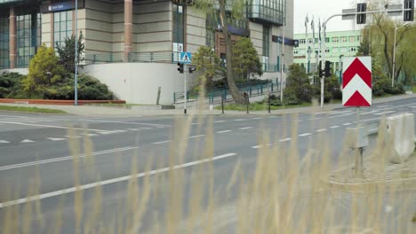 An-intersection-with-road-signs-in-Central-Europe,-captured-dynamically-in-4K-resolution