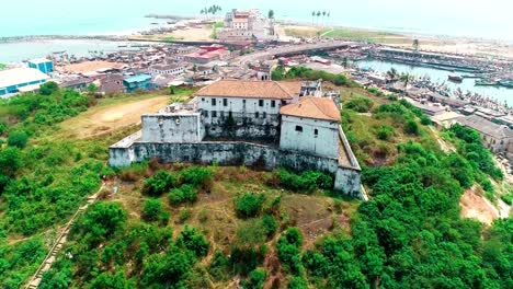 this is a drone reveal shot of a fort and castle