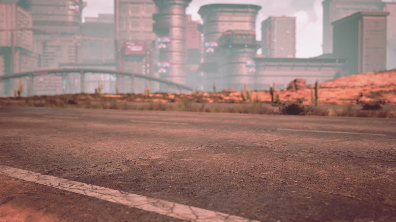 중간 모래 언덕의 비어 있는 사막 도로