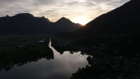 Dusk-Silhouette-of-Walensee,-Wesen-Amden,-switzerland---aerial-view