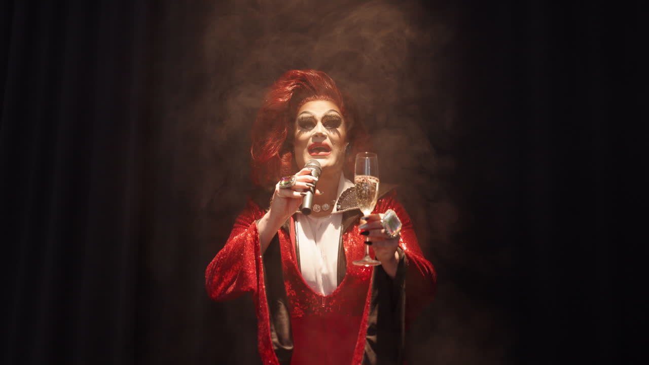 Drag Queen Performing on Stage with Champagne