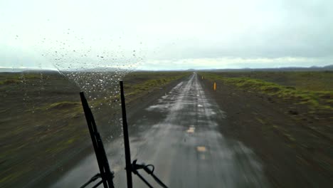 fast off road ride in buss in rainy iceland nature