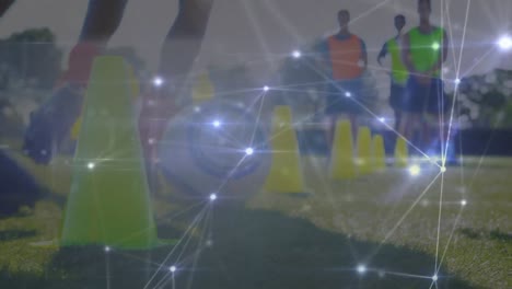 Animation-of-network-of-connections-over-football-players-practicing-on-football-field