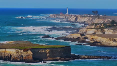 Lighthouse on a dramatic cliff overlooking the Pacific Ocean