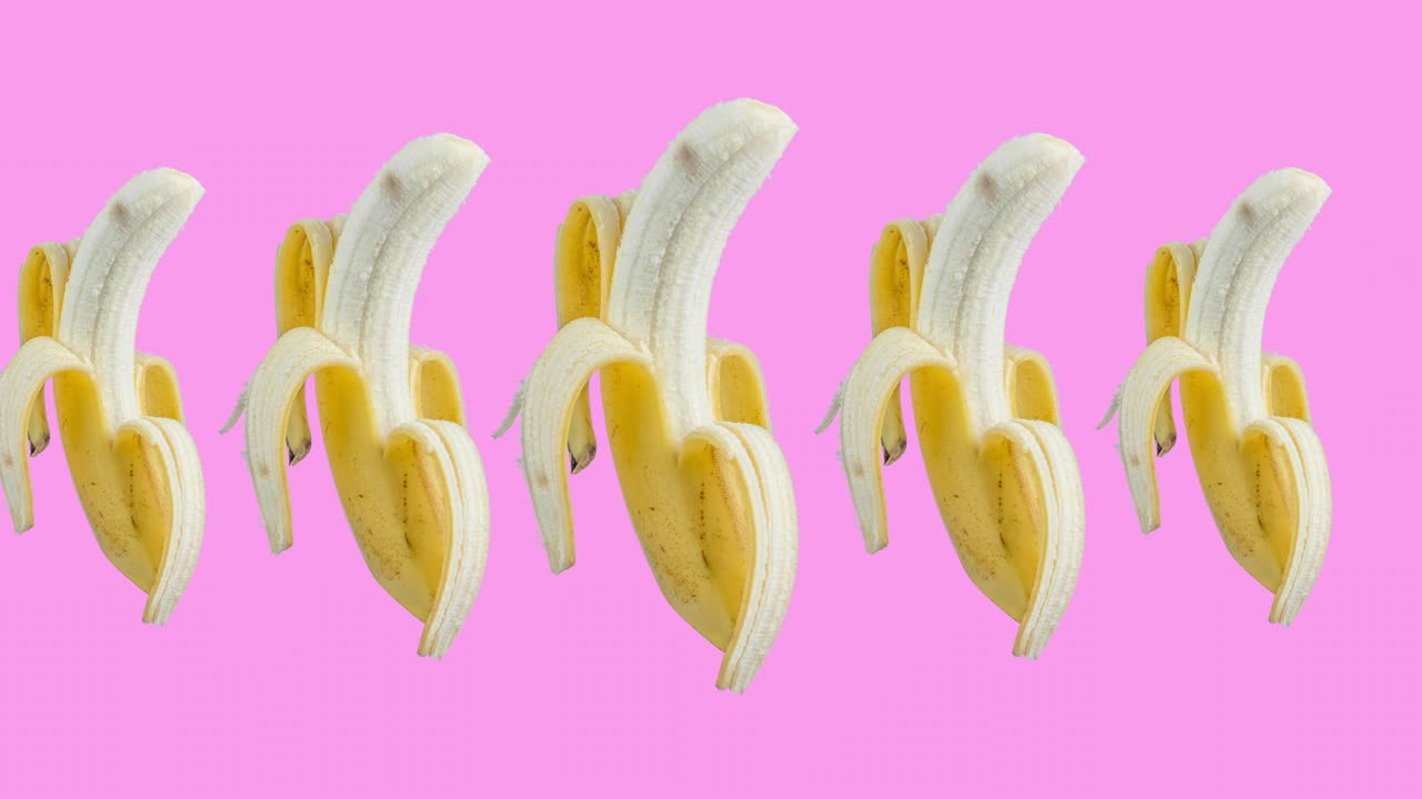 bananas animated on a pink background. seamless looping of realistic 3d food. minimal motion design art