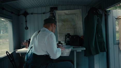 wwii military officer in control room
