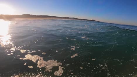 Man-surfs-the-wave-in-the-ocean