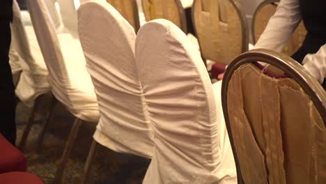 men-chair-covered-by-cloth-closeup-view