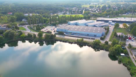 Aerial-view-of-warehouse-storages-or-industrial-factory-or-logistics-center-from-above