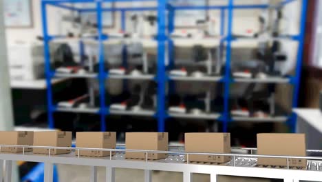 animation of cardboard boxes on conveyor belt in warehouse