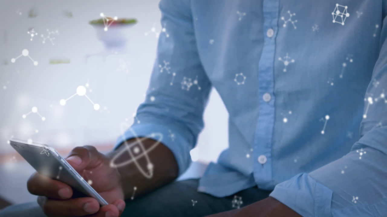 스마트폰을 이용한 이중 인종 남성에 대한 분자의 애니메이션