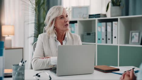 doctor consulting with a patient in her office